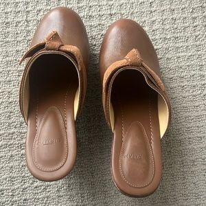 Brown leather clogs